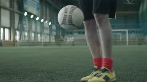 Sportsman-Practicing-Juggling-Soccer-Ball